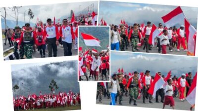 Merah Putih Membentang di Puncak Jaya, Satgas Yonif 743/PSY dan Masyarakat Bersatu Dalam Kirab Kemerdekaan